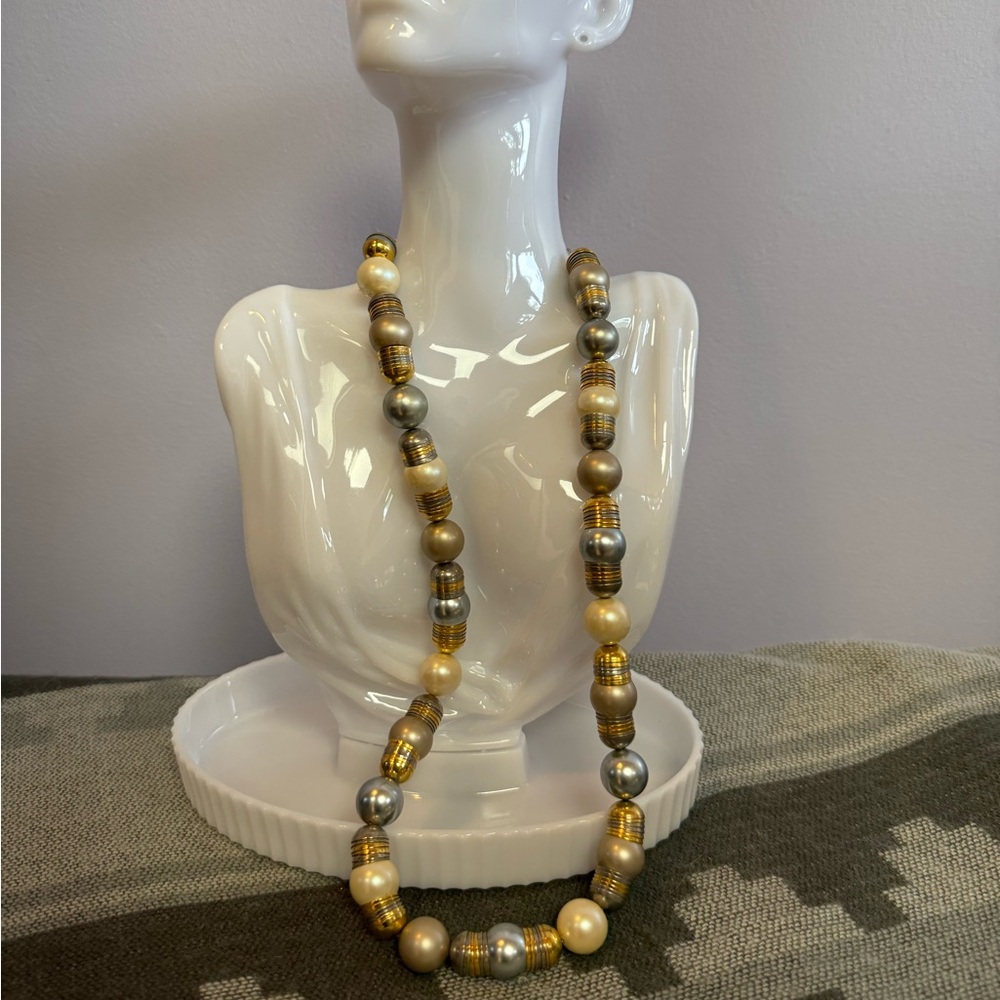 Unique mid century pearl gold/silver toned necklace. Designer tag Galanos.